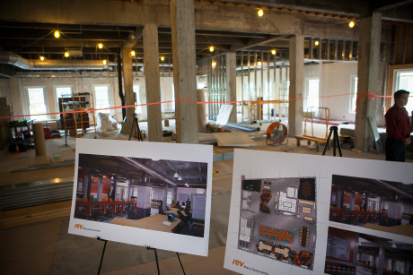 Members of the media toured the unfinished downtown Ithaca incubator, Rev. Renderings of the future space, provided by Snyder Architects, were on display.