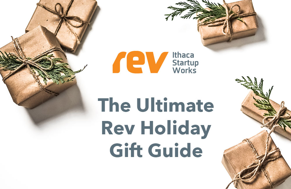 Five small gifts wrapped in gold wrapping paper with the words "The Ultimate Rev Holiday Gift Guide"