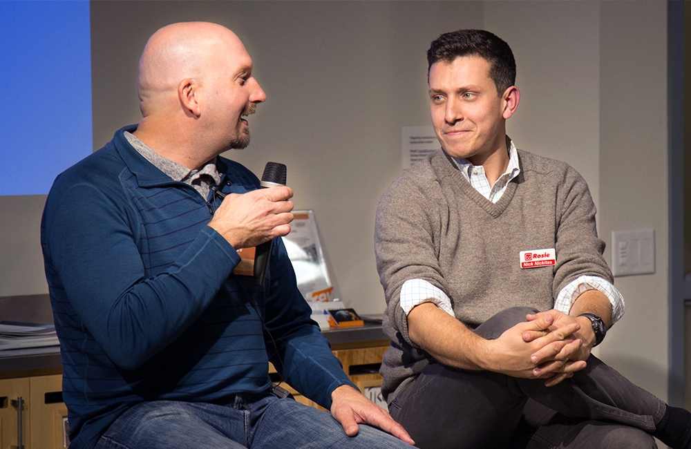 Charlie Mulligan of GiveGab speaks with Nick Nikitas of Rosie during a Rev panel discussion.