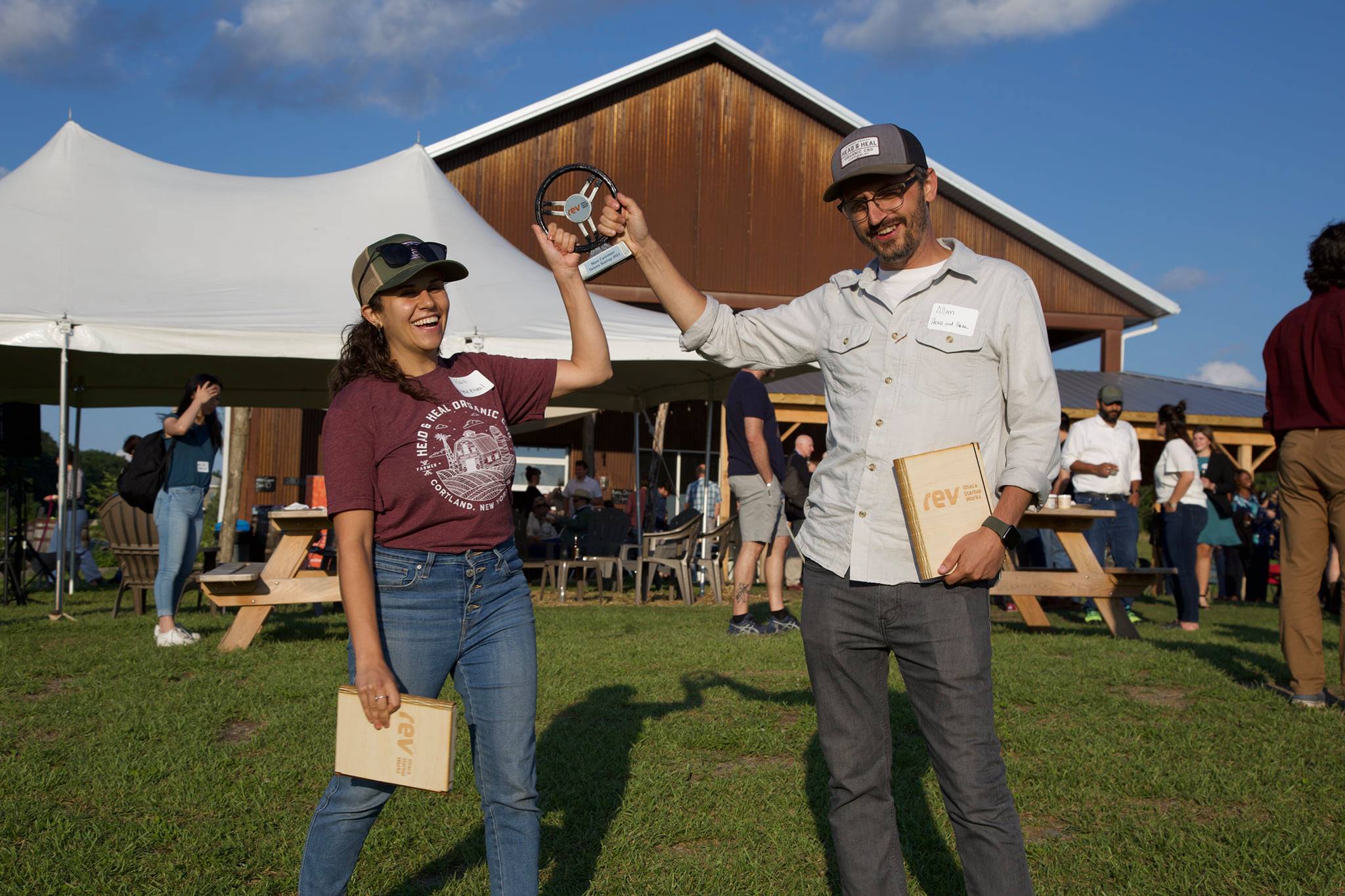 The co-founders of Head and Heal celebrate their victory with the Most Customer Driven Startup Award.